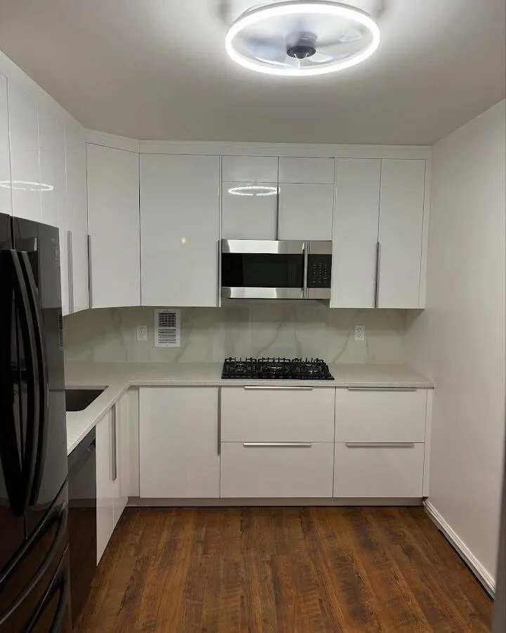 Renovated kitchen with quartz countertops in Southborough
